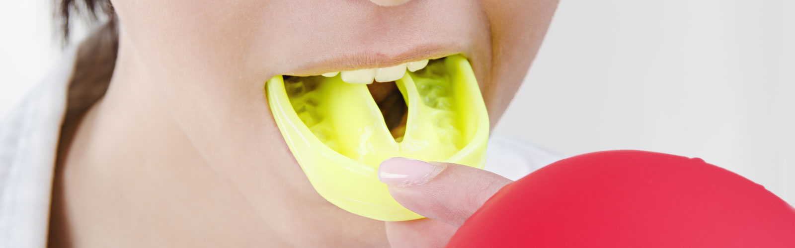 Girl wearing a sport mouth guard
